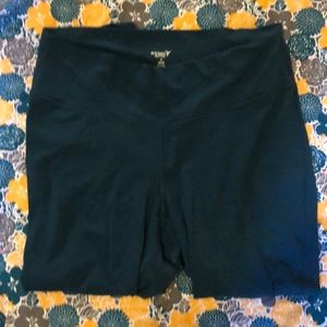 Teal leggings with criss cross detail on leg